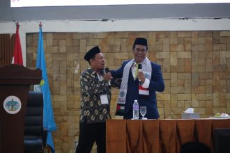 Menteri Pertanian (Mentan) Andi Amran Sulaiman saat berbicara pada Muktamar V Wahdah Islamiyah yang diselenggarakan di Jakarta, Sabtu (23/8).